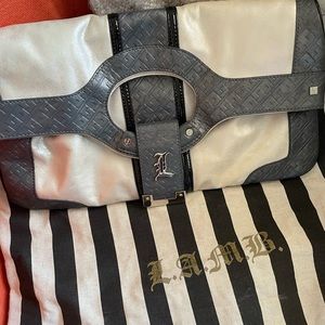 Beautiful L. A. M. B. Clutch